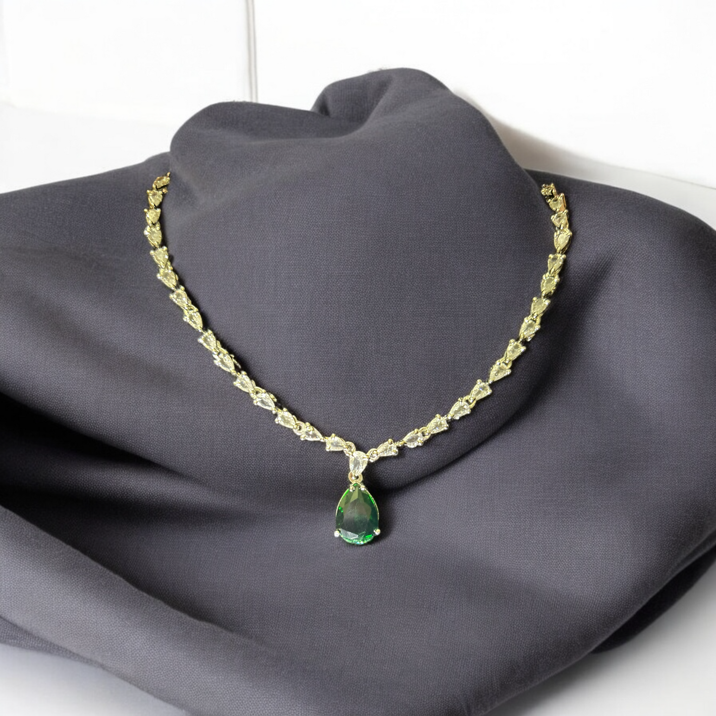 Arya Green AD Necklace Set – Timeless green stone AD necklace set for women, perfect for weddings, parties, and special occasions.