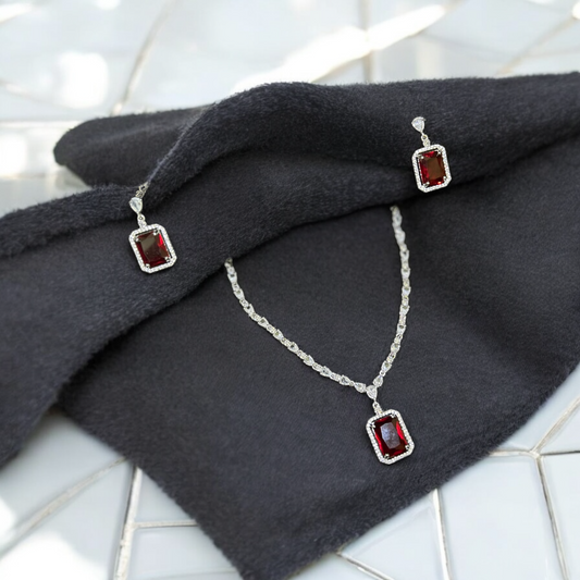 Ruby Necklace Set with red gemstones, an elegant and luxurious jewelry piece for special occasions.